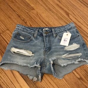 Shorts never worn still has the tags on them
